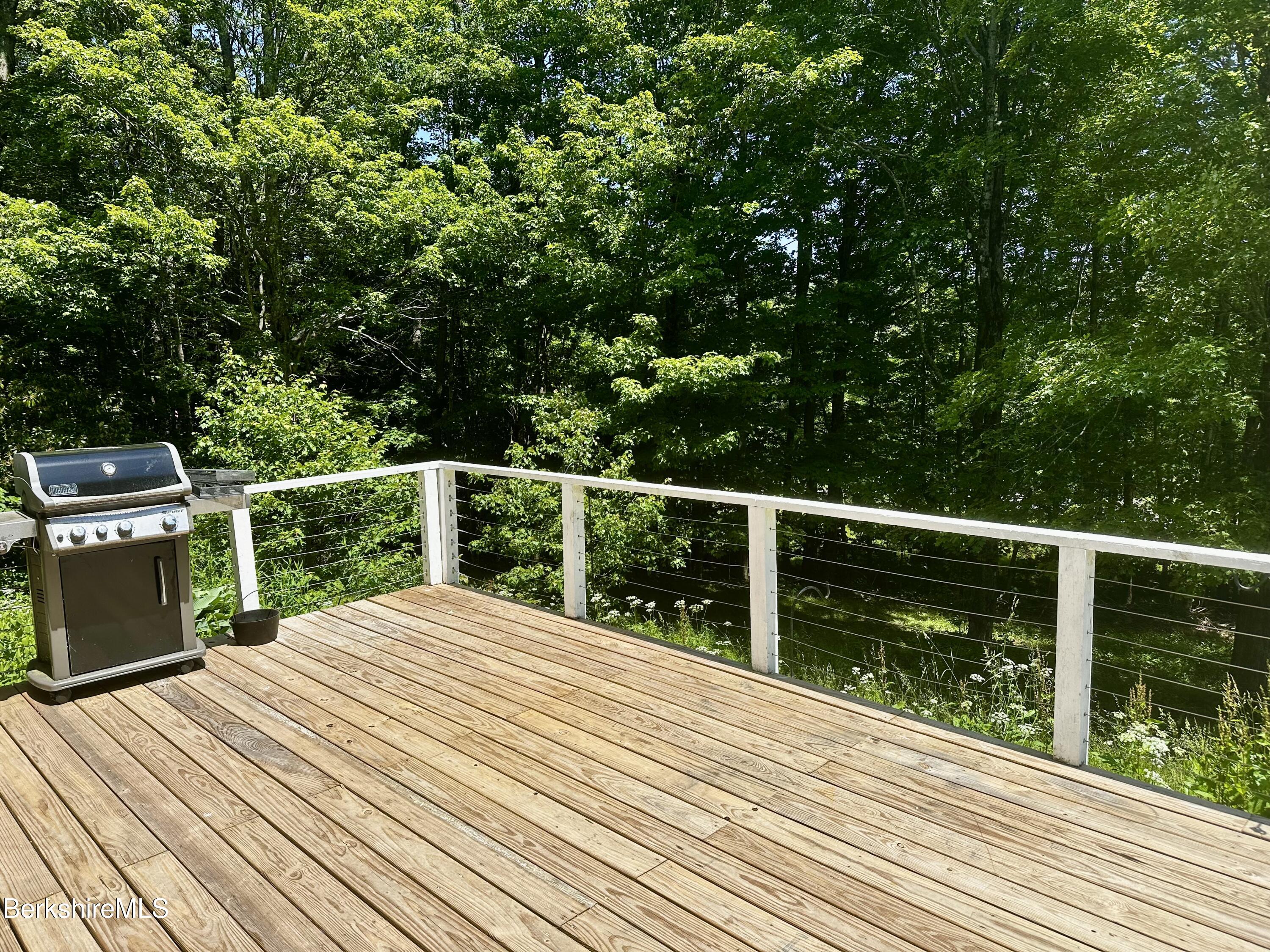1689 East Windsor Road Windsor, MA 01270 - Photo 10 of 57 a view of balcony with wooden floor and fence