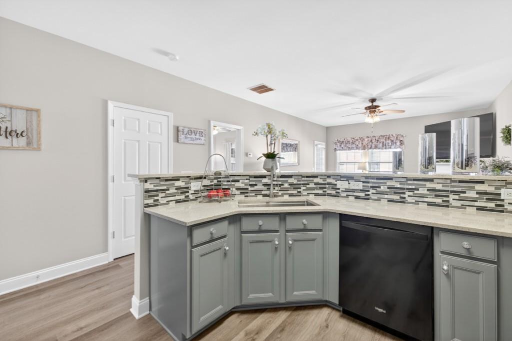 160 Riley Circle Dawsonville, GA 30534 - Photo 13 of 52 a kitchen with a sink stove and cabinets