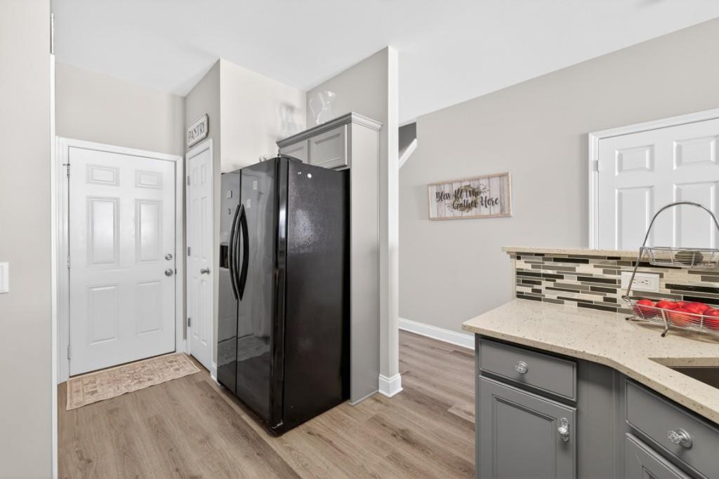 160 Riley Circle Dawsonville, GA 30534 - Photo 14 of 52 a kitchen with a refrigerator and a sink