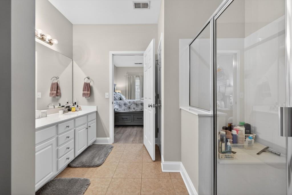 160 Riley Circle Dawsonville, GA 30534 - Photo 22 of 52 a bathroom with a sink and a mirror