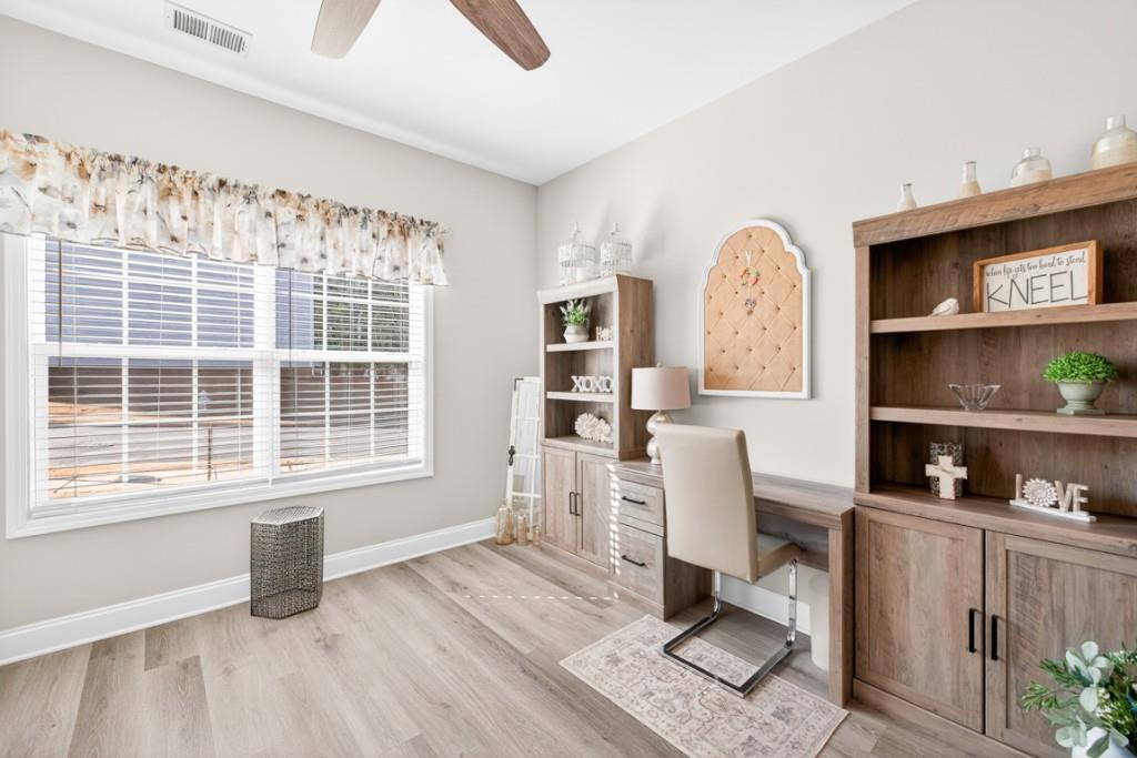 160 Riley Circle Dawsonville, GA 30534 - Photo 24 of 52 a room with furniture and a window