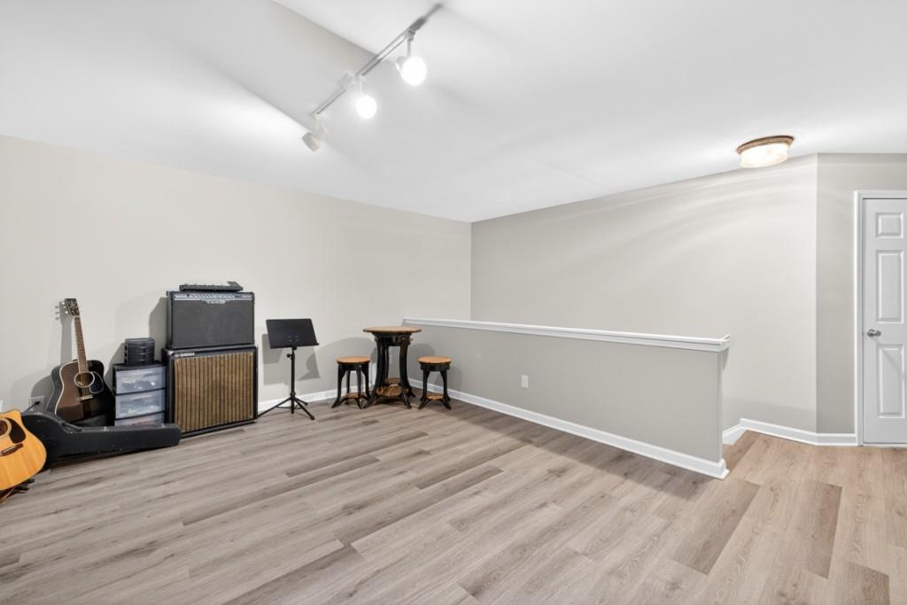 160 Riley Circle Dawsonville, GA 30534 - Photo 28 of 52 a view of a workspace with furniture and wooden floor