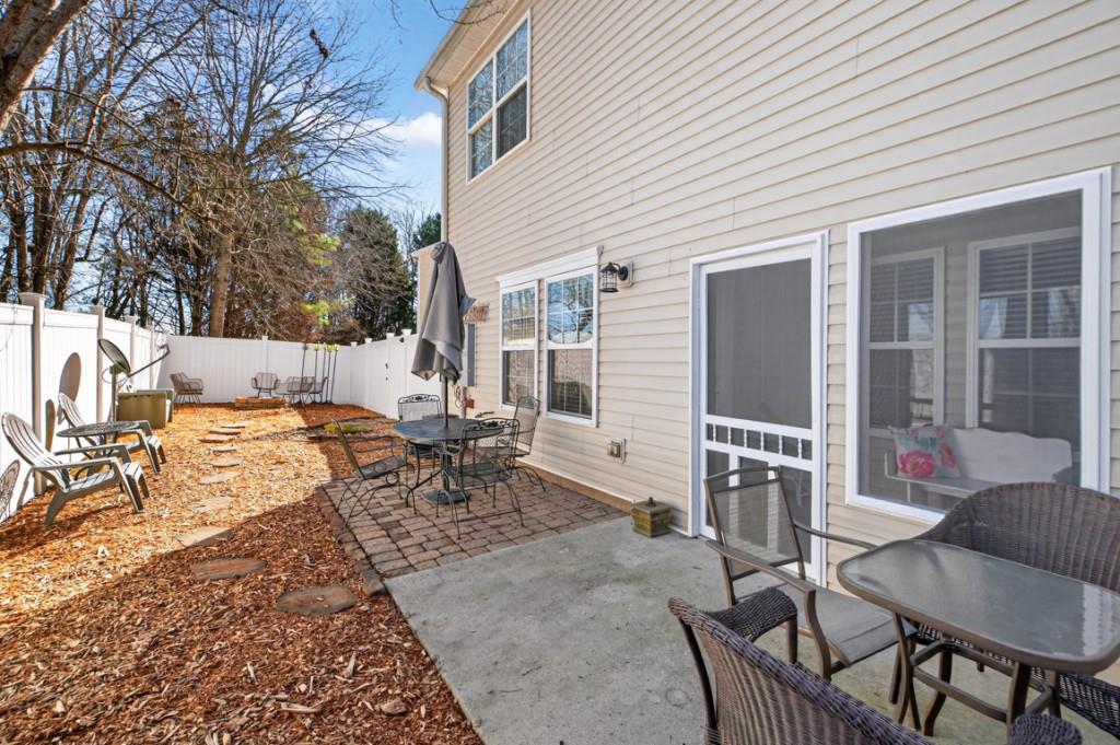160 Riley Circle Dawsonville, GA 30534 - Photo 38 of 52 a view of a patio with a table and chairs in patio