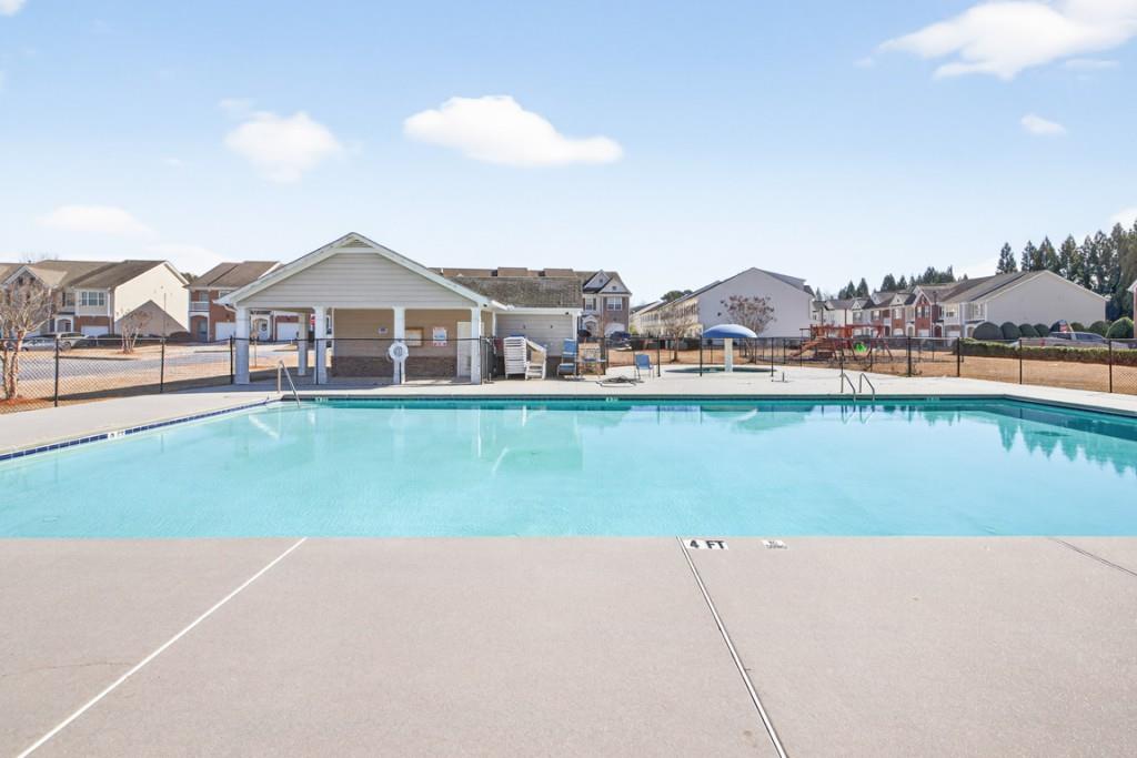 160 Riley Circle Dawsonville, GA 30534 - Photo 45 of 52 a view of a house with a yard and a large tree center in the back