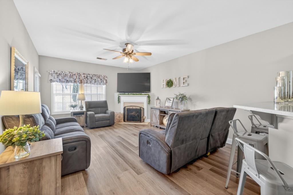 160 Riley Circle Dawsonville, GA 30534 - Photo 7 of 52 a living room with furniture fireplace and a flat screen tv
