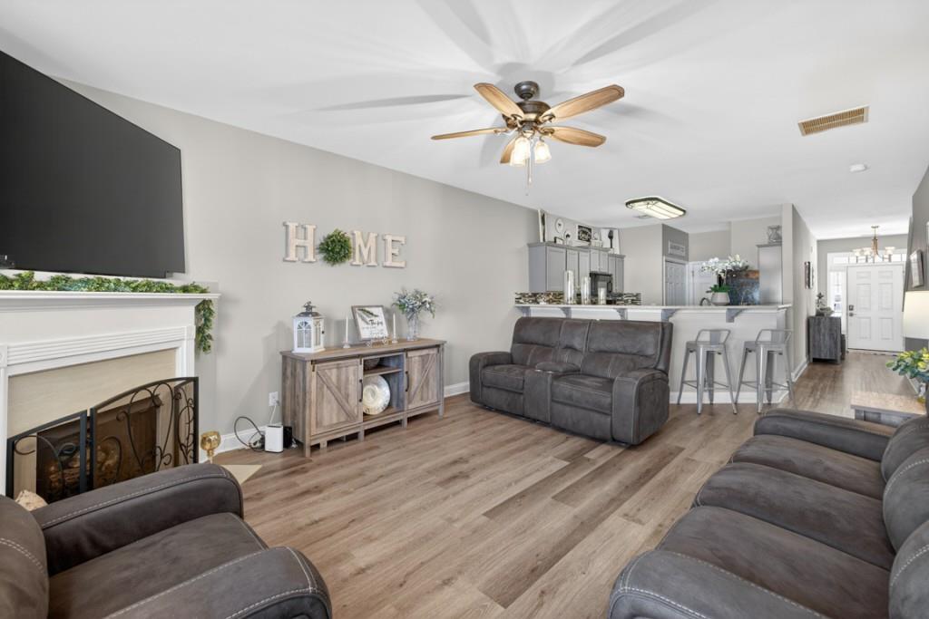 160 Riley Circle Dawsonville, GA 30534 - Photo 9 of 52 a living room with furniture and a flat screen tv