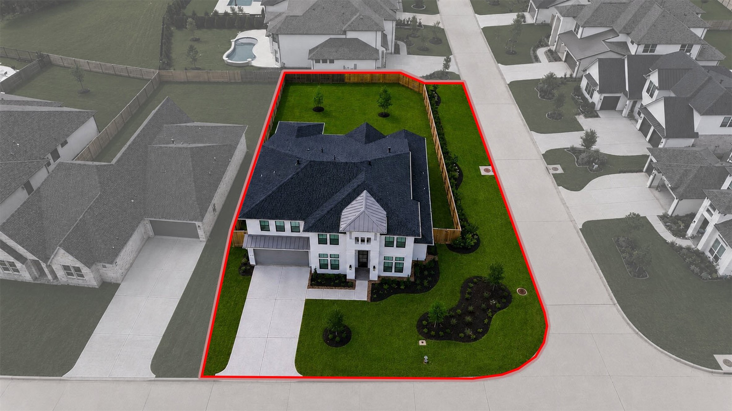 416 Venado View Court Conroe, TX 77304 - Photo 30 of 34 Expansive oversized corner homesite showcasing exceptional curb appeal, extended driveway space, and a generously sized backyard ideal for future outdoor living and entertaining.