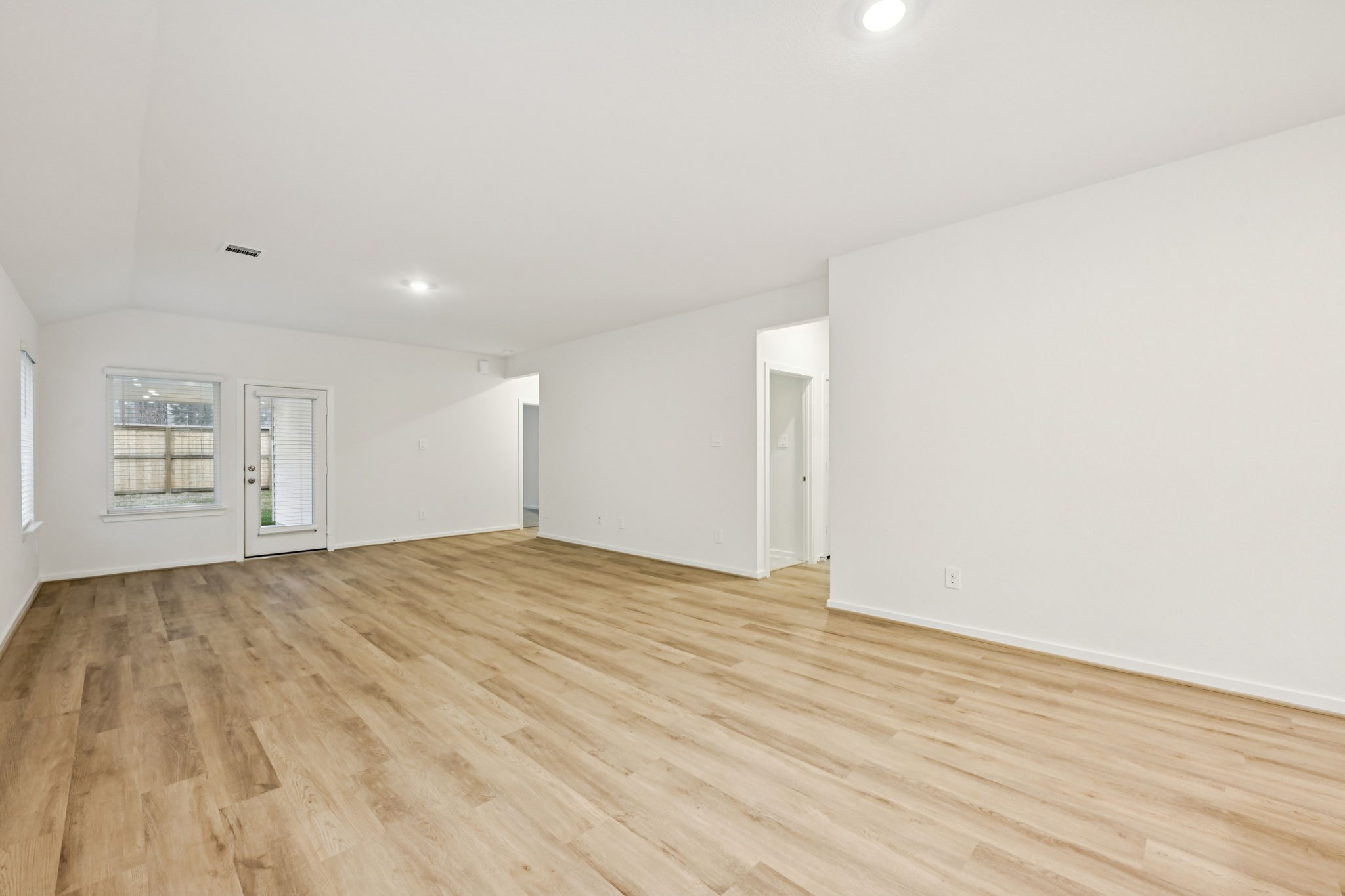 16213 Parish Pointe Court Conroe, TX 77302 - Photo 13 of 32 a view of empty room with closet and wooden floor