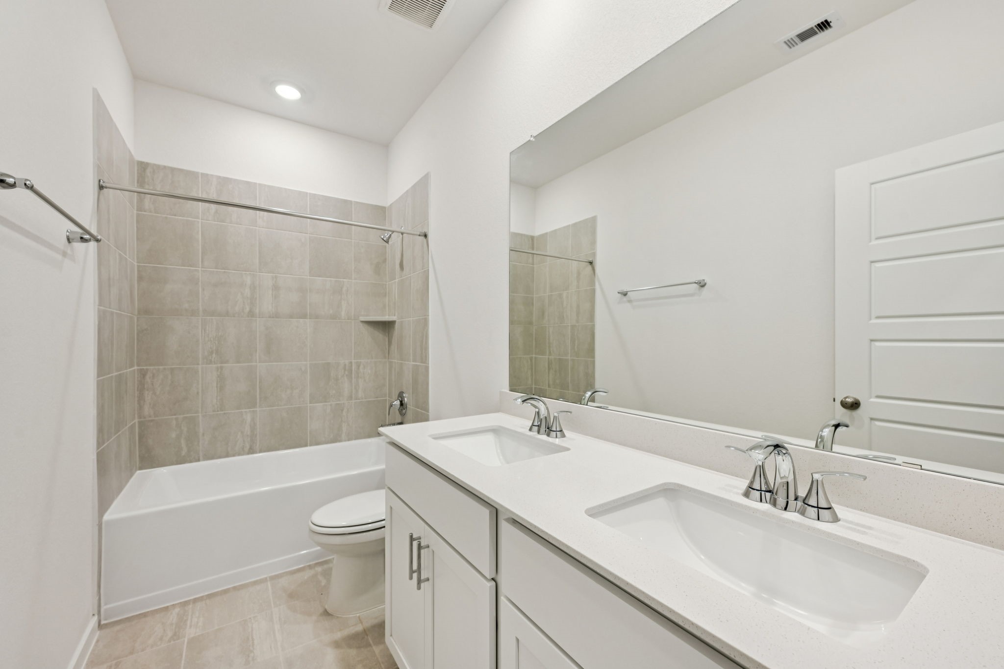 16213 Parish Pointe Court Conroe, TX 77302 - Photo 15 of 32 a bathroom with a sink a toilet and shower