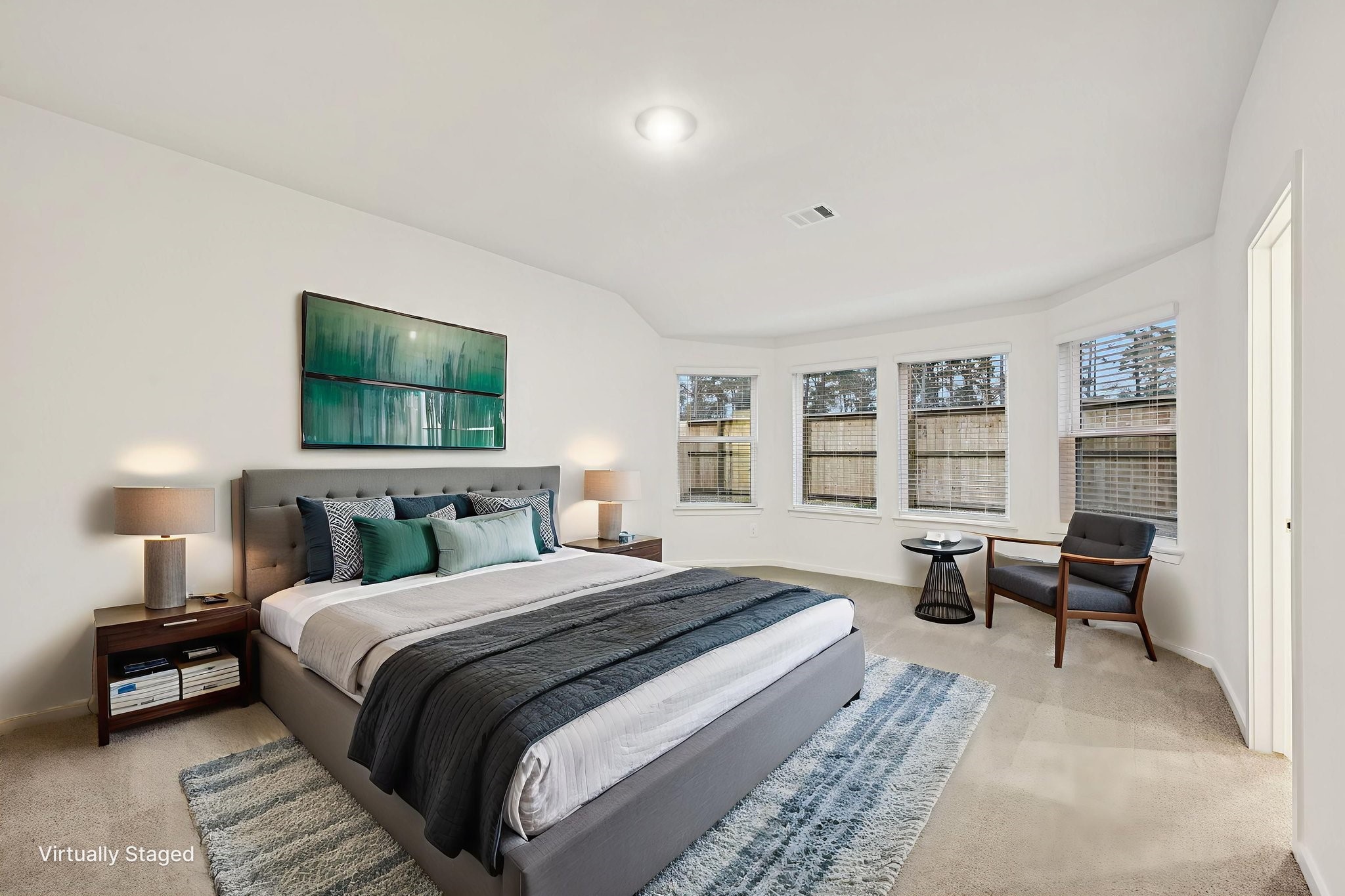 16213 Parish Pointe Court Conroe, TX 77302 - Photo 21 of 32 a bedroom with a bed and a couch