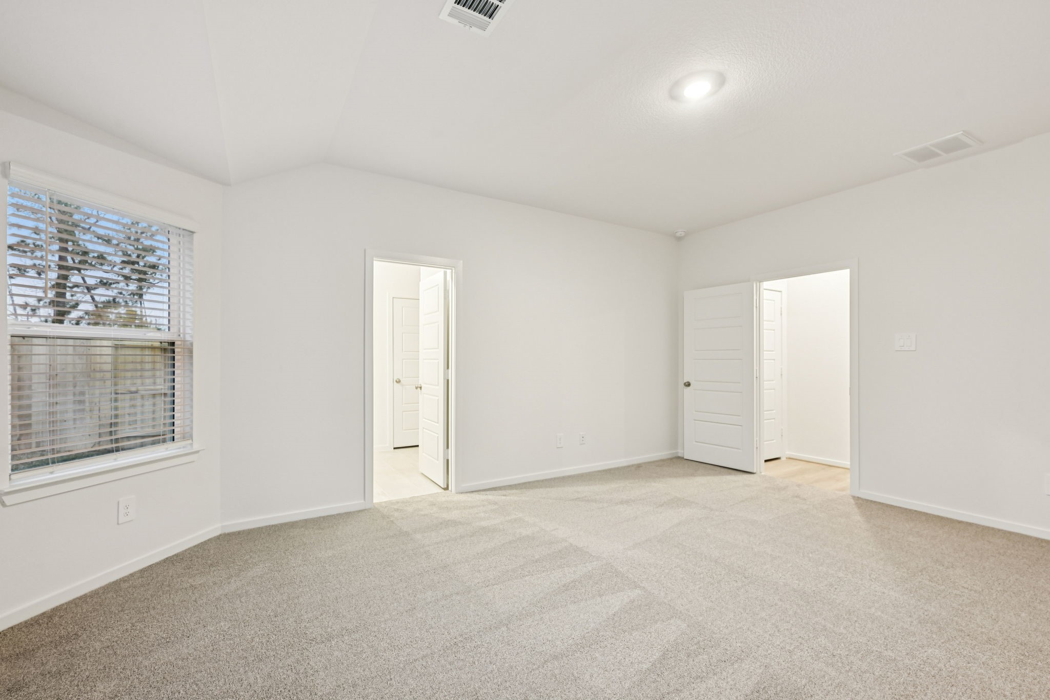 16213 Parish Pointe Court Conroe, TX 77302 - Photo 22 of 32 an empty room with windows