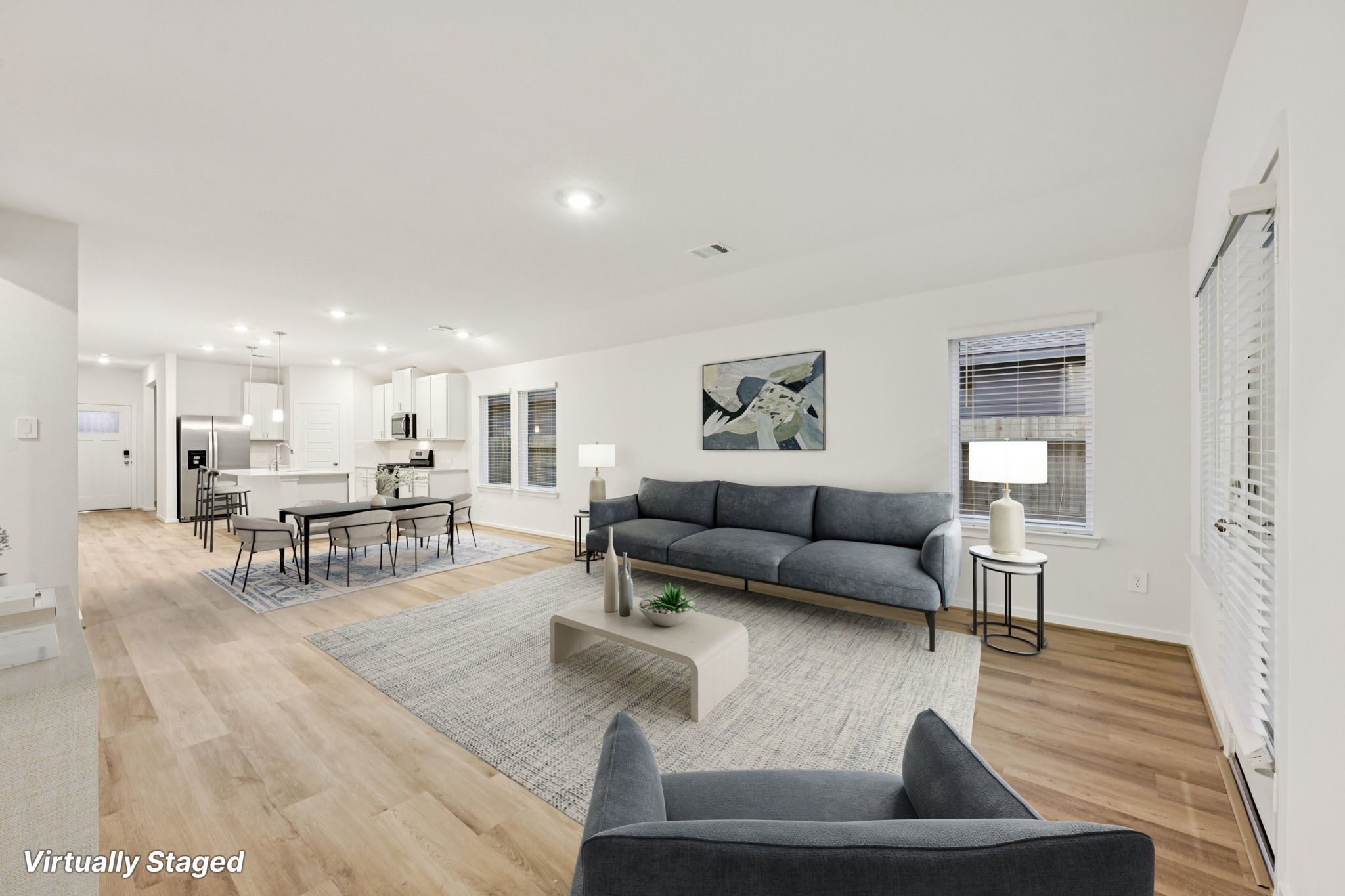 16213 Parish Pointe Court Conroe, TX 77302 - Photo 8 of 32 a living room with furniture and a table