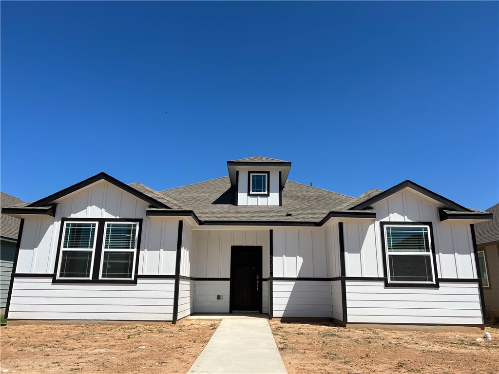 a front view of a house with a front door