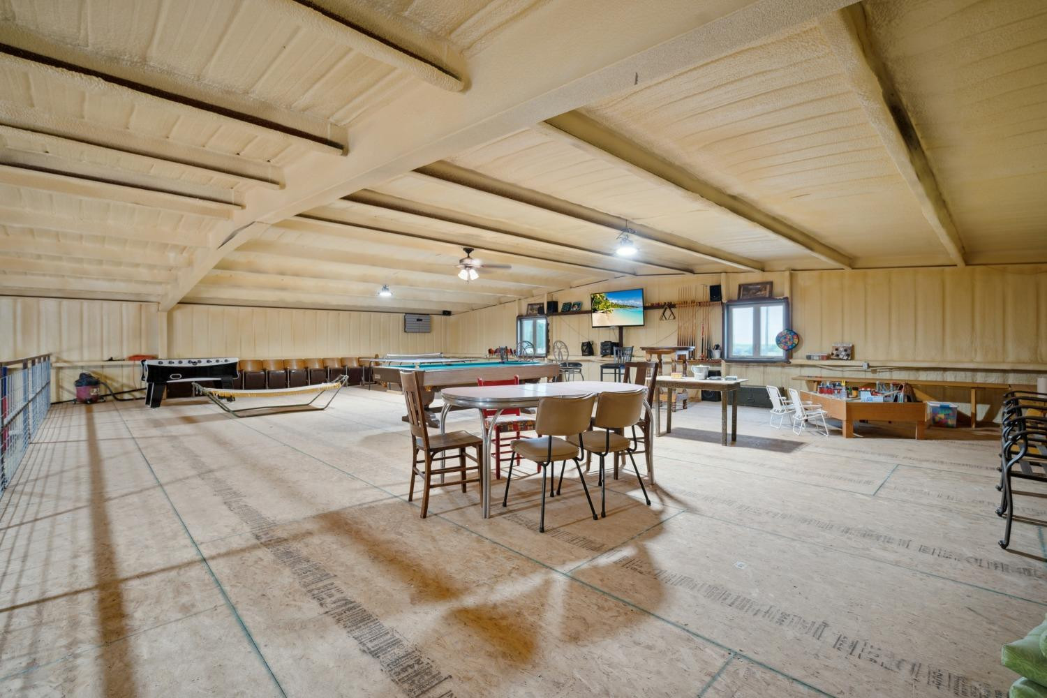 9002 Woodrow Road Wolfforth, TX 79382 - Photo 29 of 48 a view of a dining hall with lots of furniture and a chandelier