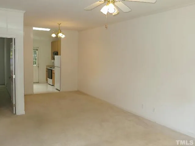 an empty room with a bathroom