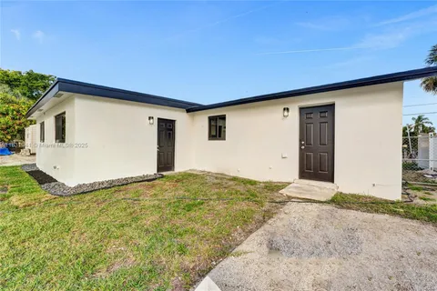 a view of backyard of house