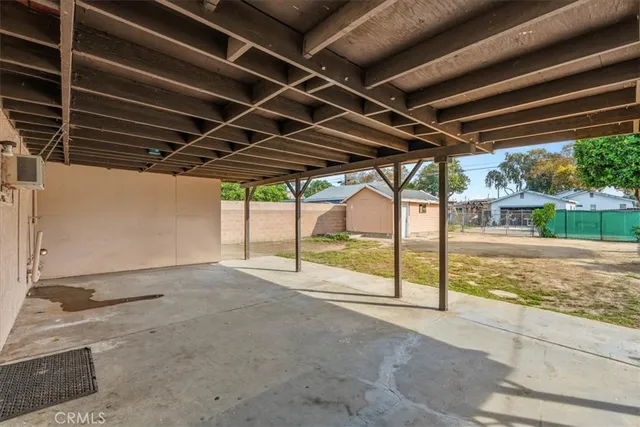 a view of a backyard of the house