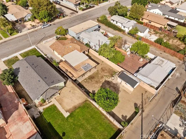an aerial view of a house with a garden
