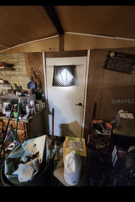 9237 Southeast 58th Drive Okeechobee, FL 34974 - Photo 13 of 15 a room with storage and utility