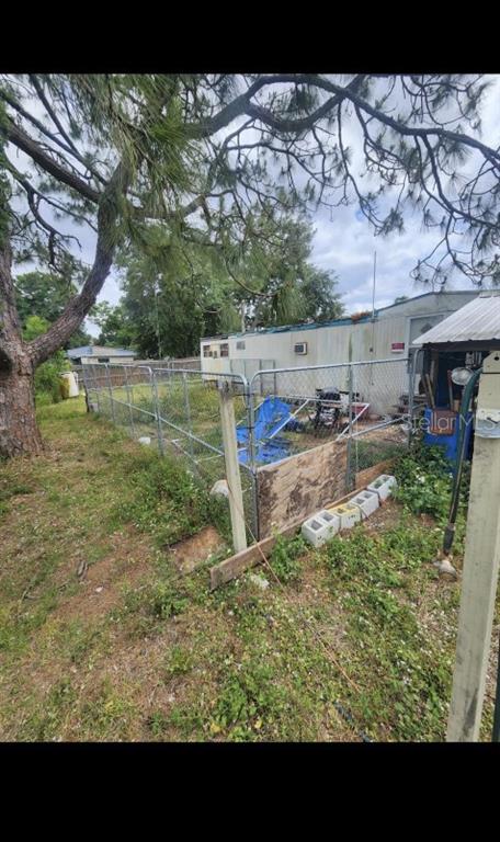 9237 Southeast 58th Drive Okeechobee, FL 34974 - Photo 5 of 15 a view of outdoor space and yard