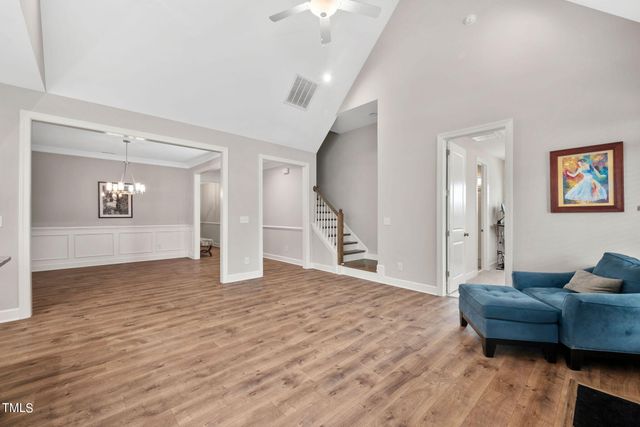 a view of a livingroom with furniture and wooden floor
