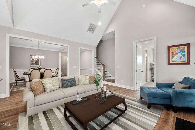 a living room with furniture and a couch