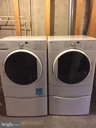 a view of street with houses on both side