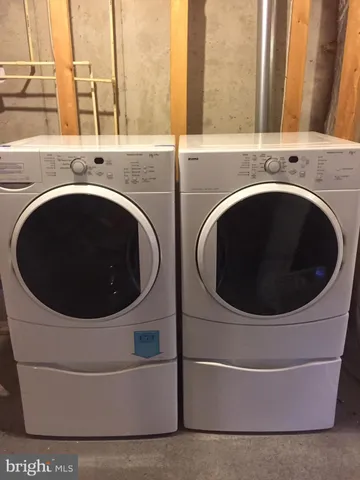 a view of street with houses on both side