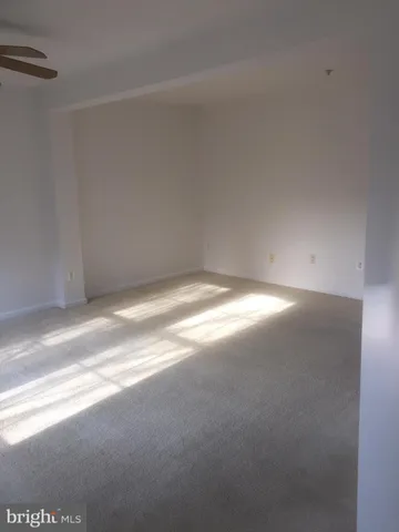 a view of a hallway with staircase