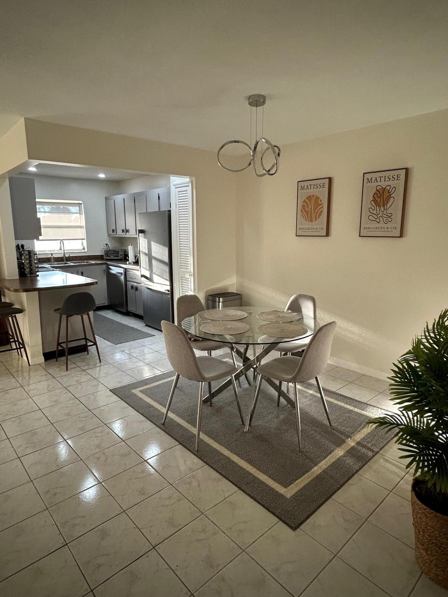 1301 Northwest 12th Avenue, Unit 411A Boca Raton, FL 33486 - Photo 11 of 32 Dining Room