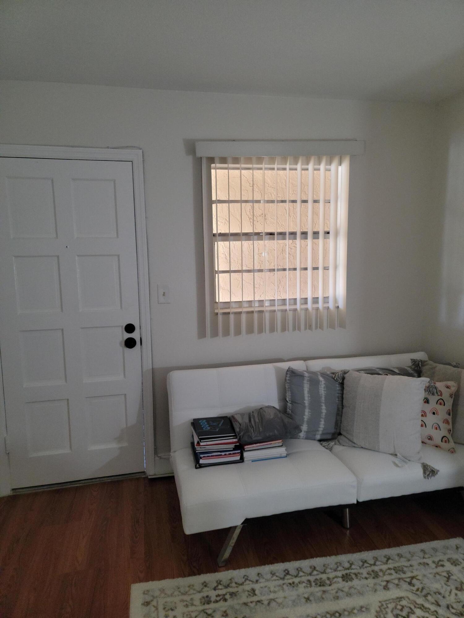 1301 Northwest 12th Avenue, Unit 411A Boca Raton, FL 33486 - Photo 19 of 32 Room 3 with door to outside