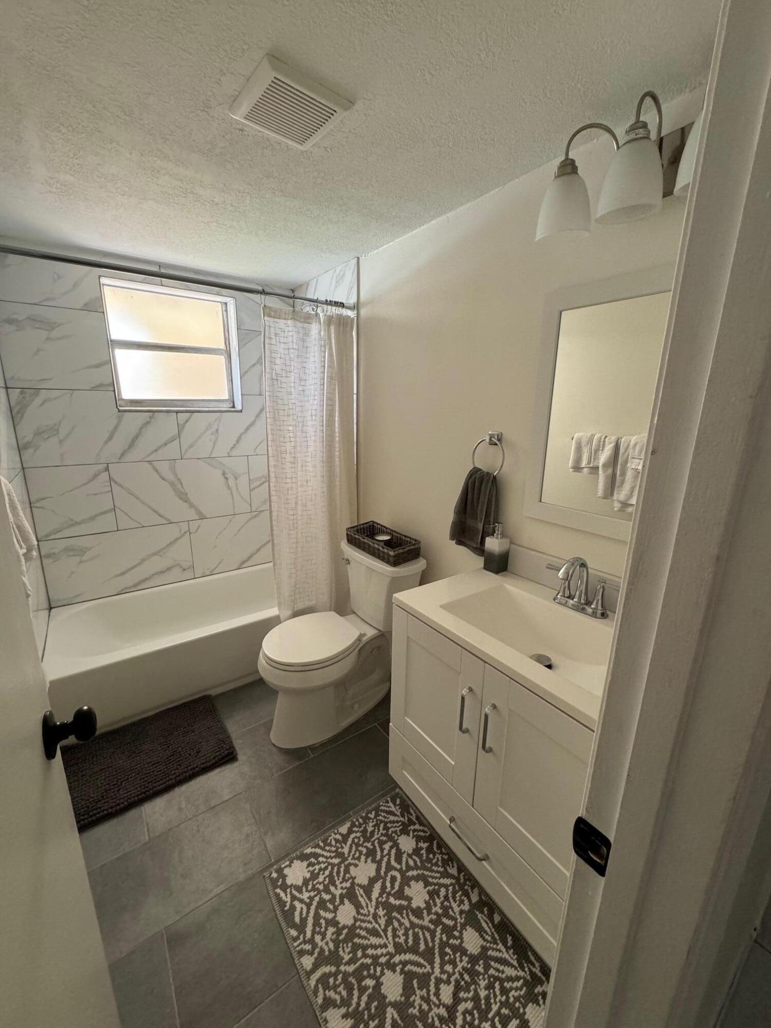 1301 Northwest 12th Avenue, Unit 411A Boca Raton, FL 33486 - Photo 20 of 32 Guest Bathroom