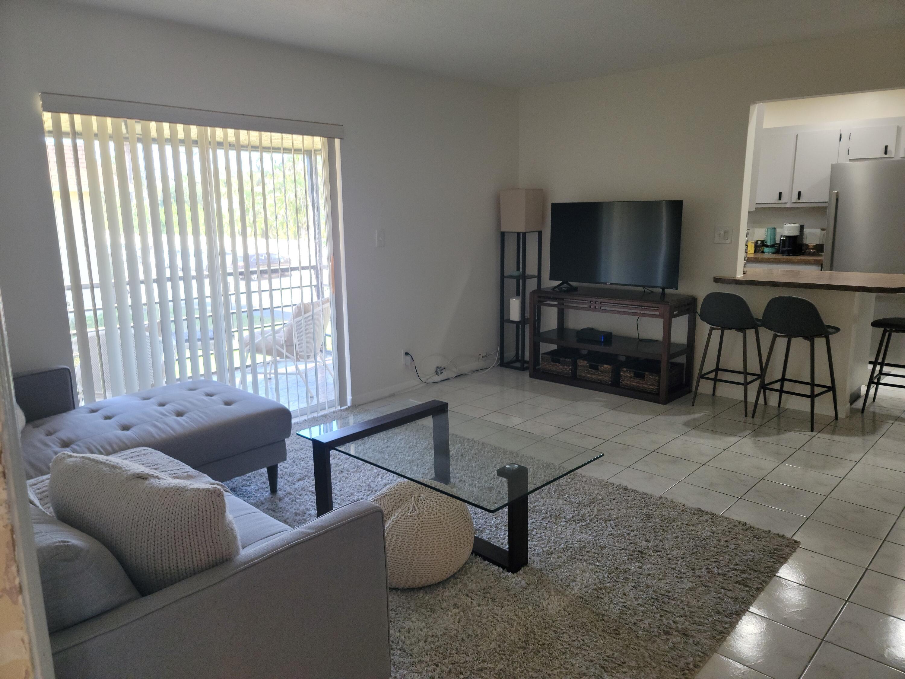 1301 Northwest 12th Avenue, Unit 411A Boca Raton, FL 33486 - Photo 4 of 32 LIVING RM 2