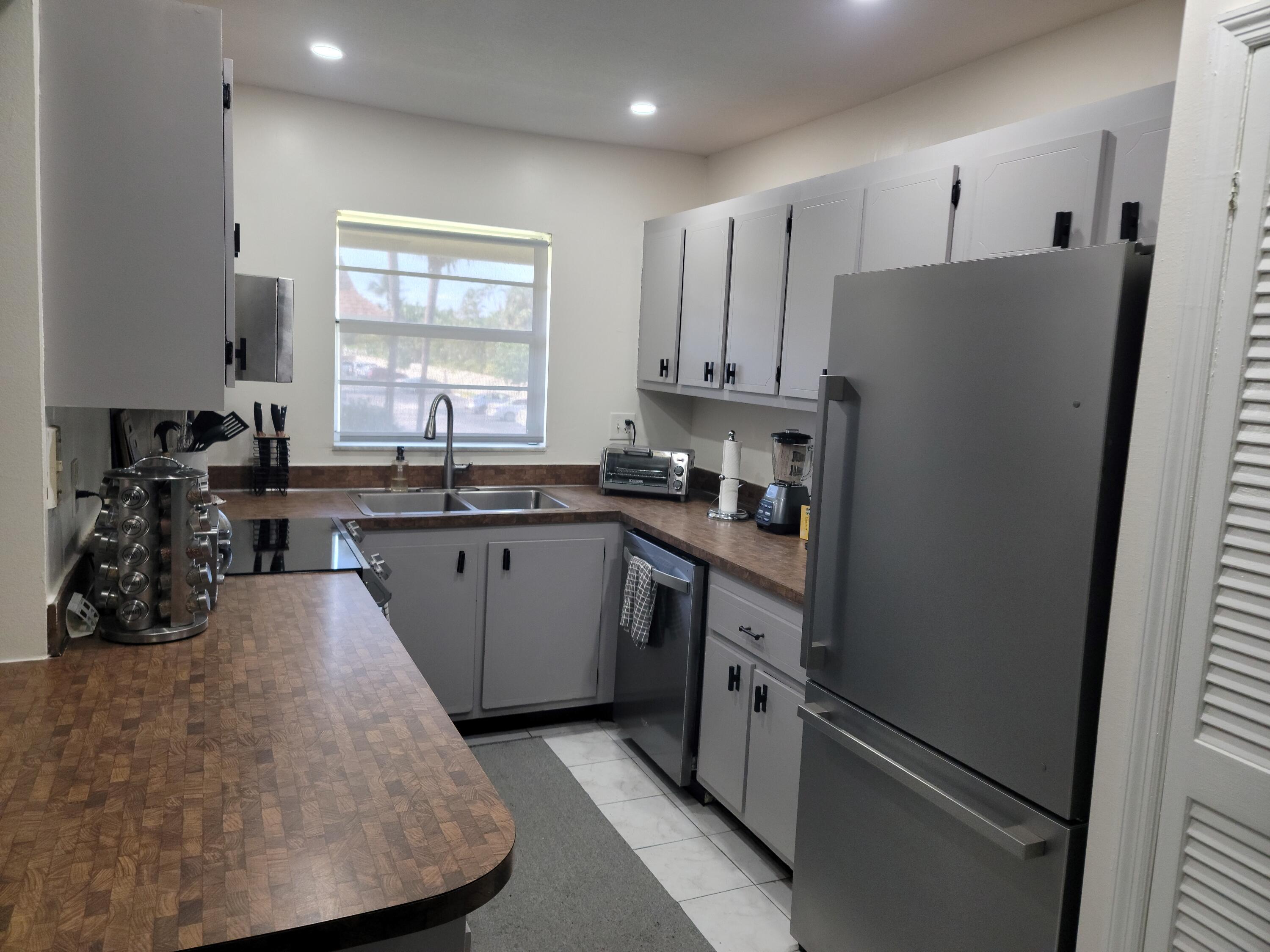 1301 Northwest 12th Avenue, Unit 411A Boca Raton, FL 33486 - Photo 8 of 32 KITCHEN 2