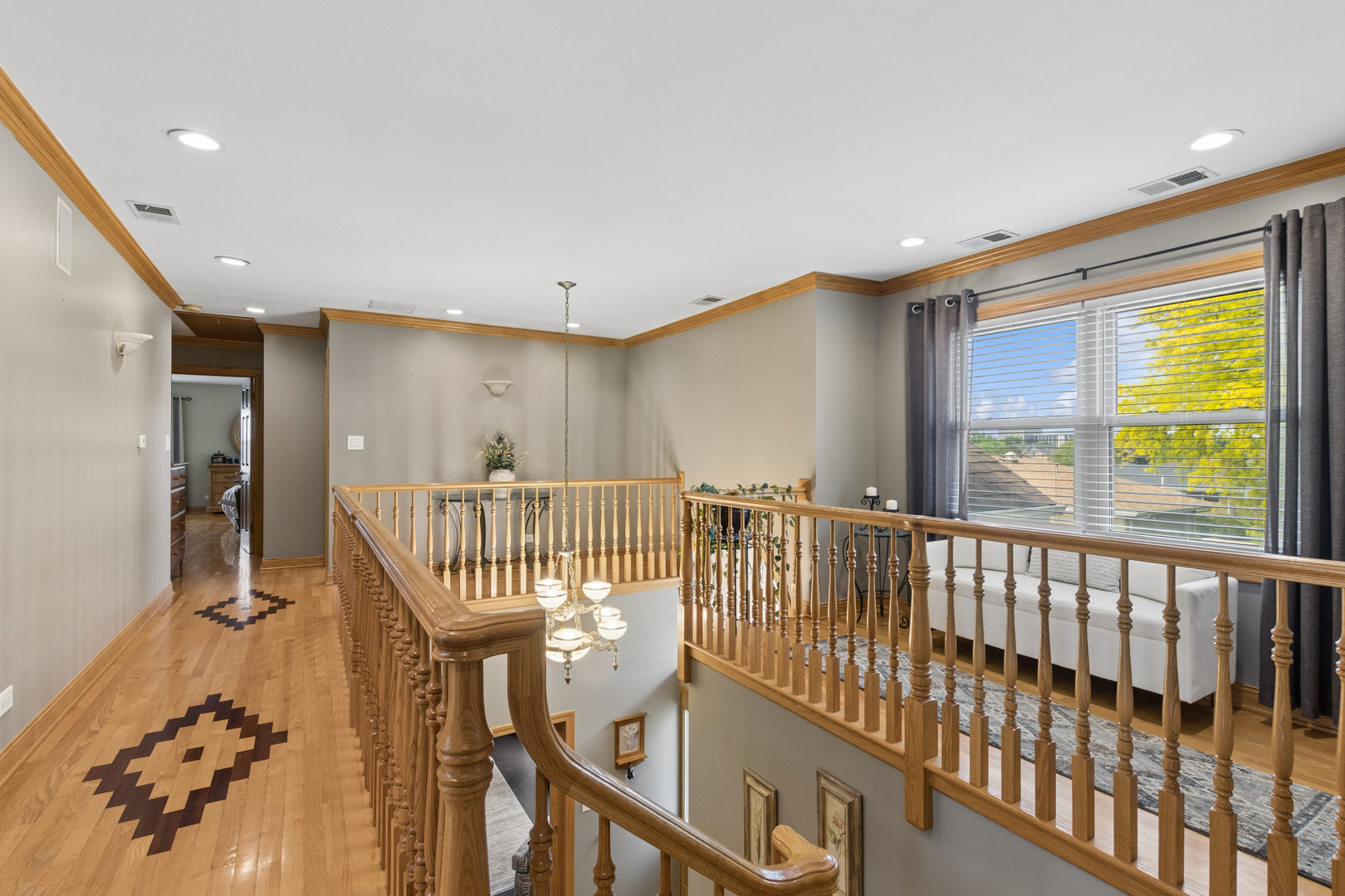 7911 West Rascher Avenue Chicago, IL 60656 - Photo 27 of 39 a view of a hallway with wooden floor and windows