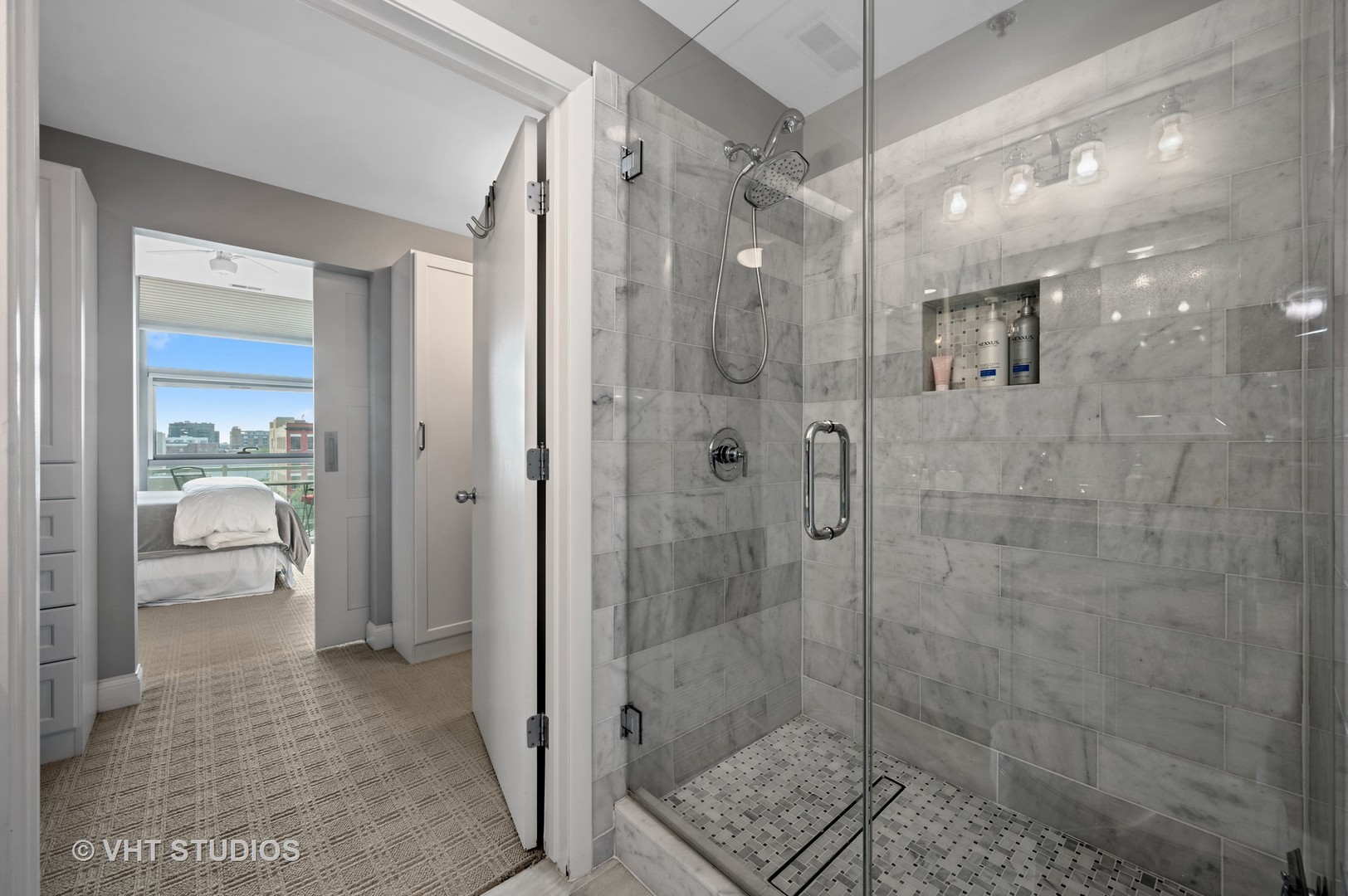 225 South Sangamon Street, Unit 509 Chicago, IL 60607 - Photo 11 of 20 a bathroom with a shower and a sink