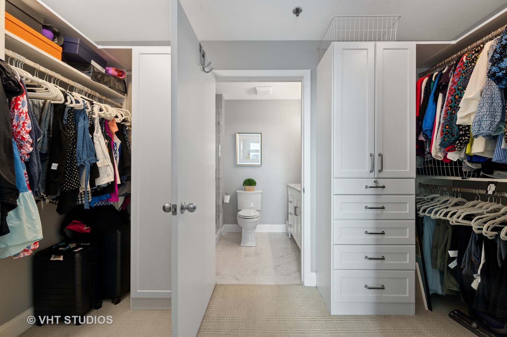 225 South Sangamon Street, Unit 509 Chicago, IL 60607 - Photo 12 of 20 a view of walk in closet with clothes and shoes