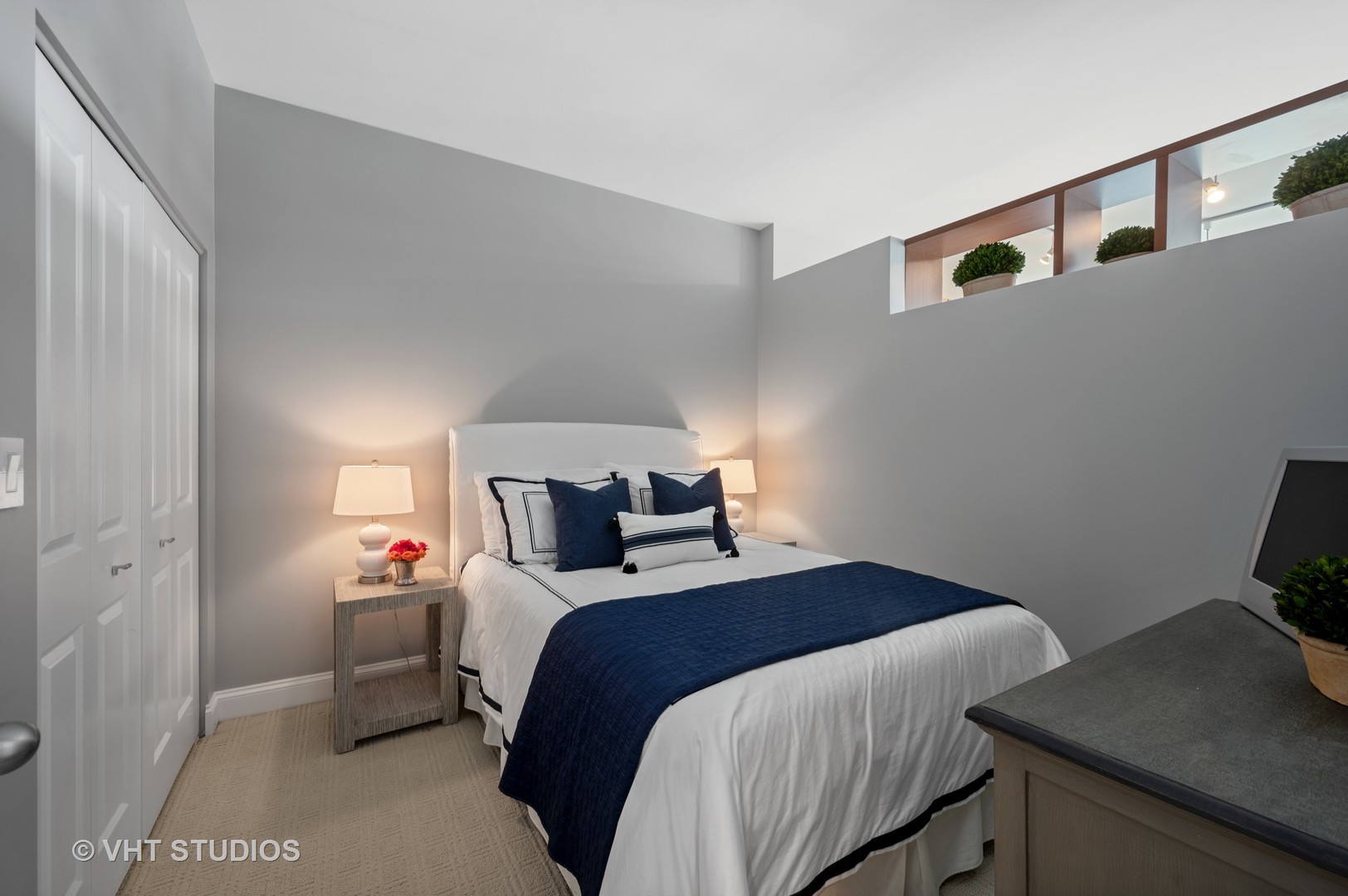 225 South Sangamon Street, Unit 509 Chicago, IL 60607 - Photo 14 of 20 a bedroom with a bed and a desk in it