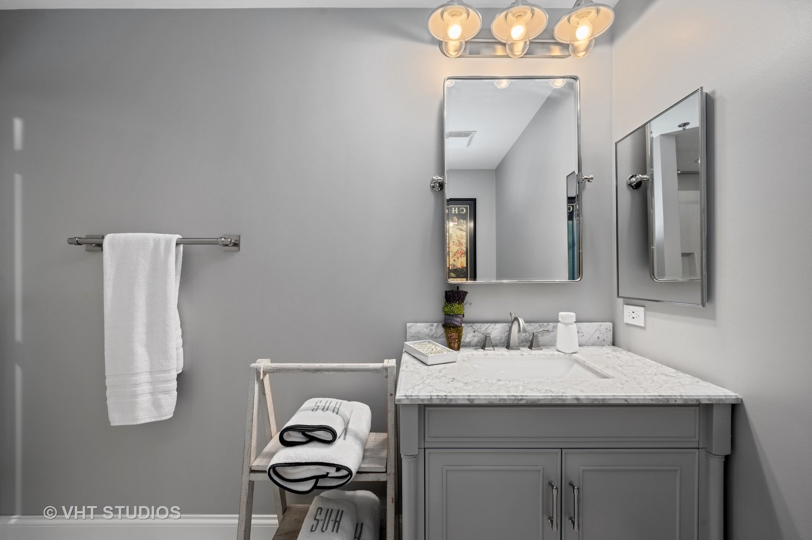 225 South Sangamon Street, Unit 509 Chicago, IL 60607 - Photo 16 of 20 a bathroom with a sink and a mirror