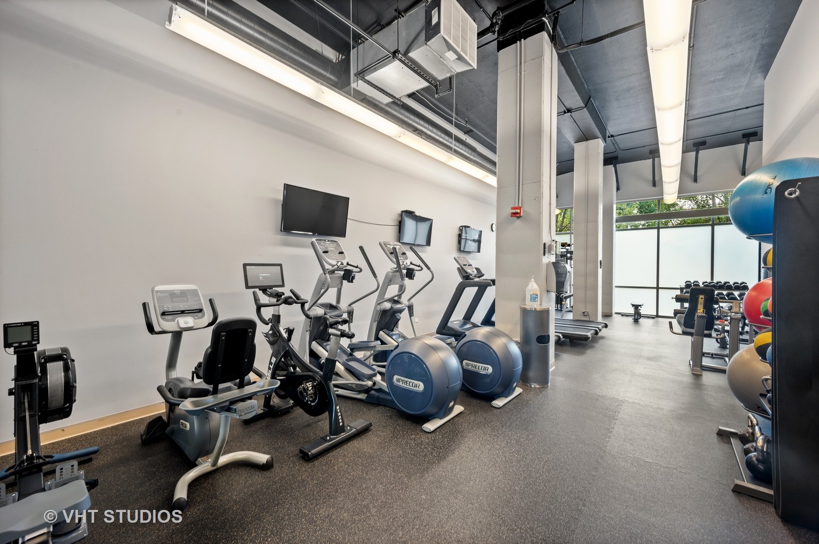 225 South Sangamon Street, Unit 509 Chicago, IL 60607 - Photo 19 of 20 a view of a room with gym equipment