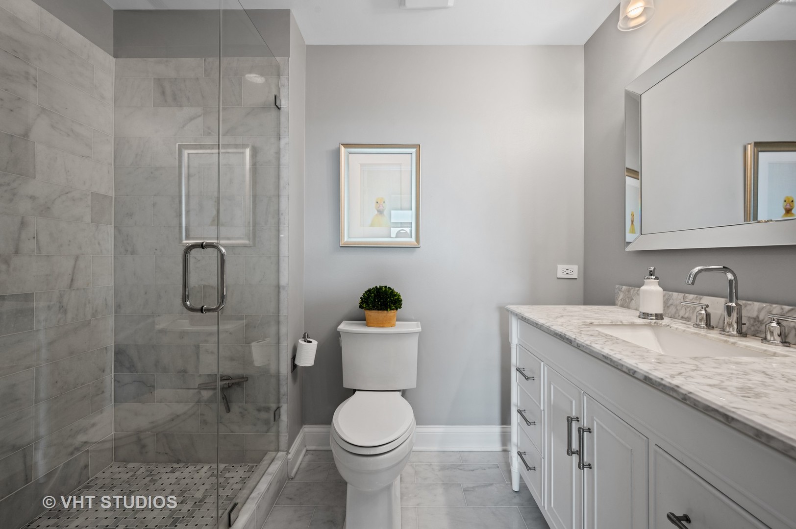 225 South Sangamon Street, Unit 509 Chicago, IL 60607 - Photo 10 of 20 a bathroom with a granite countertop toilet sink and shower