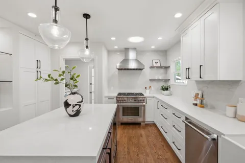 a bathroom with a sink toilet and mirror