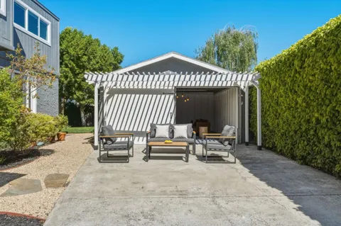 a sign on a pole on a street