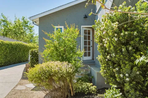 a view of street with sitting area