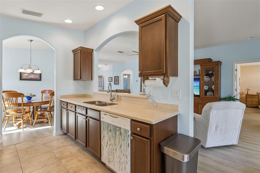 3601 Arlington Ridge Boulevard Leesburg, FL 34748 - Photo 14 of 44 a bathroom with a sink vanity and mirror