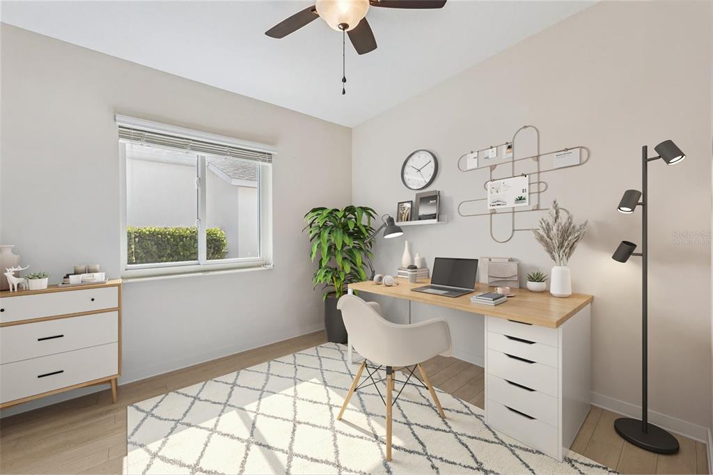 3601 Arlington Ridge Boulevard Leesburg, FL 34748 - Photo 21 of 44 a living room with furniture and a window