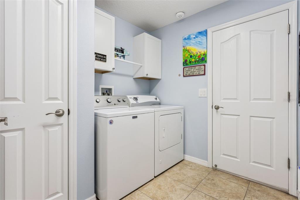 3601 Arlington Ridge Boulevard Leesburg, FL 34748 - Photo 22 of 44 a view of kitchen with cabinets and window