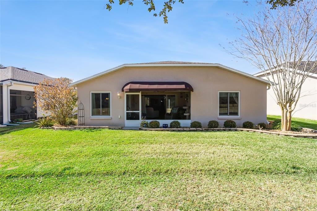 3601 Arlington Ridge Boulevard Leesburg, FL 34748 - Photo 24 of 44 a view of a house with backyard