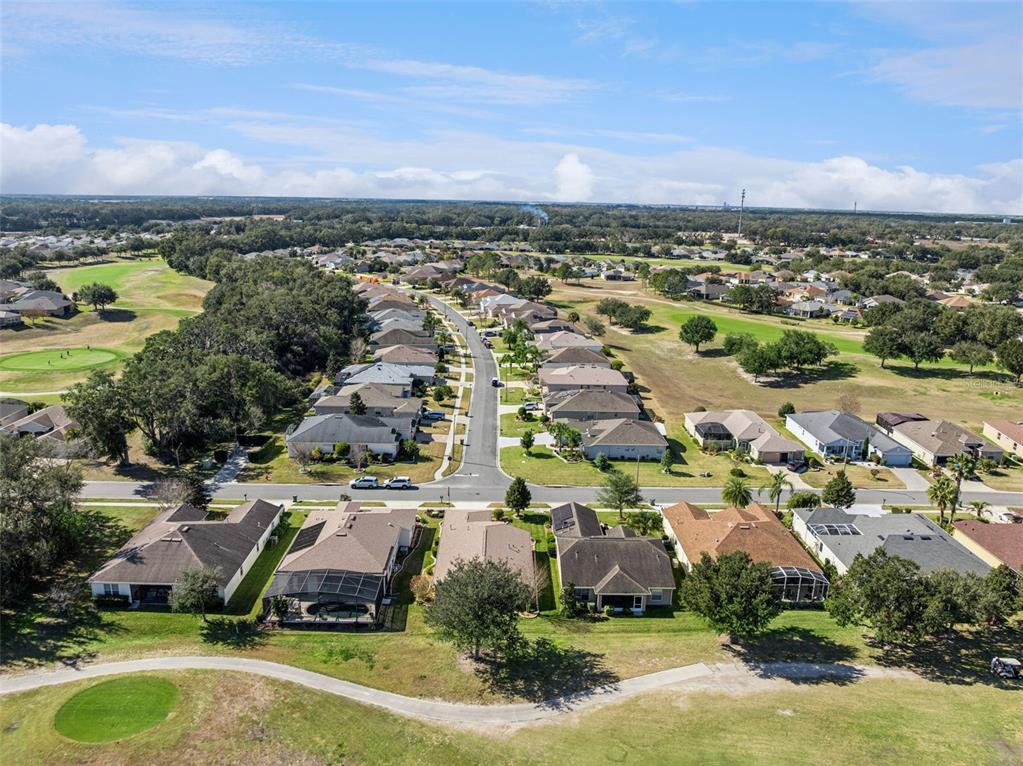 3601 Arlington Ridge Boulevard Leesburg, FL 34748 - Photo 28 of 44 an aerial view of residential houses with outdoor space and trees