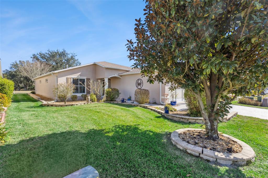 3601 Arlington Ridge Boulevard Leesburg, FL 34748 - Photo 3 of 44 a view of a house with a yard